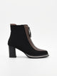 Elegant black booties with metallic detail and Azr closure