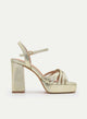SANDALO DORATO METALLIZZATO CON TACCO LARGO E PIATTAFORMA E SOTTILI STRAPPI.