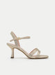 GOLDEN SANDAL WITH THIN HEEL AND STRAPS.