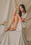 Brown flat sandals with gold detail