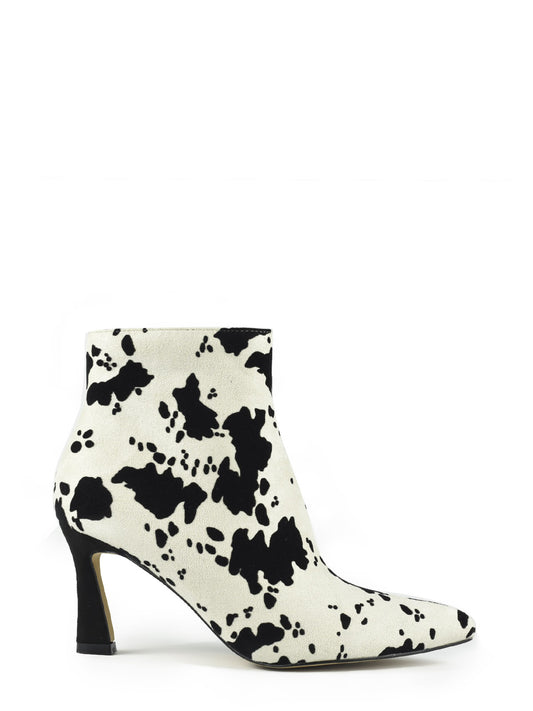 Black and white cow ankle boots with thin heel
