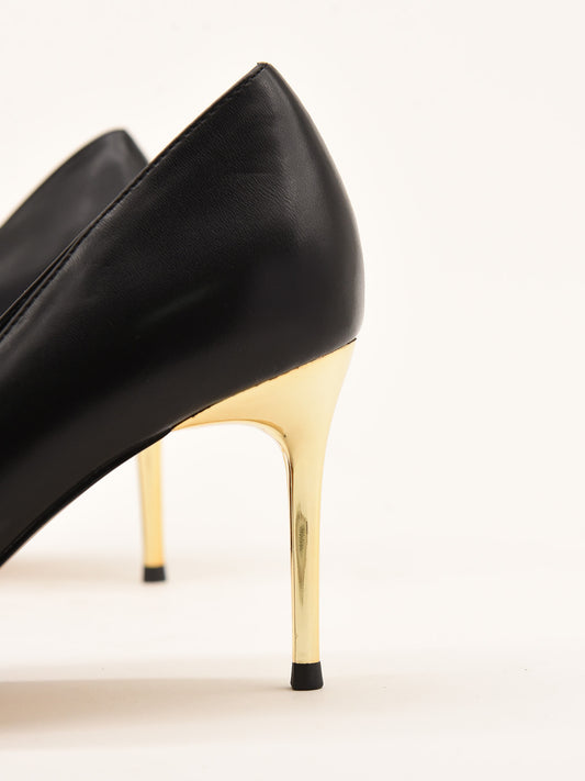 Black court shoe with gold toe and heel