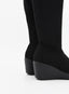 Bota alta negra con cuña