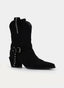 Black cowboy-style boot with buckle.