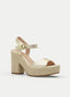 SANDALIA DE TACÓN DORADA CON PLATAFORMA DE YUTE
