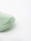 Zapatilla slip-on de punto knit en degradado verde menta y gris, con suela chunky verde y logo Nyrex en relieve lateral.