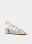 Silver sandals with braided straps and medium heel