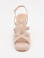 Sandalias nude de charol con tacón alto y plataforma