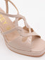 Sandalias nude de charol con tacón alto y plataforma