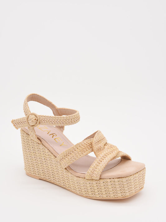 Sandalias de cuña en rafia beige con plataforma