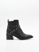 Black ankle boot with studs and wide heel