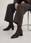 Brown Heel Boot with Patent Toe Cap.