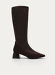 Brown high boot with a wide heel and pointed toe.