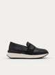 Black sporty wedge moccasin with elastic bands.