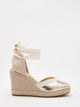 Golden wedge espadrilles with ribbons