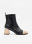 Botín negro puntera tacon beige  para mujer
