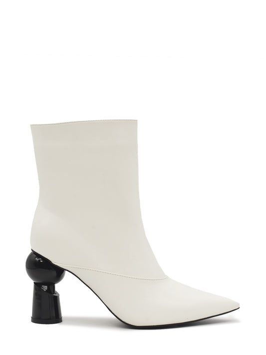 White ankle boots with black circle heel