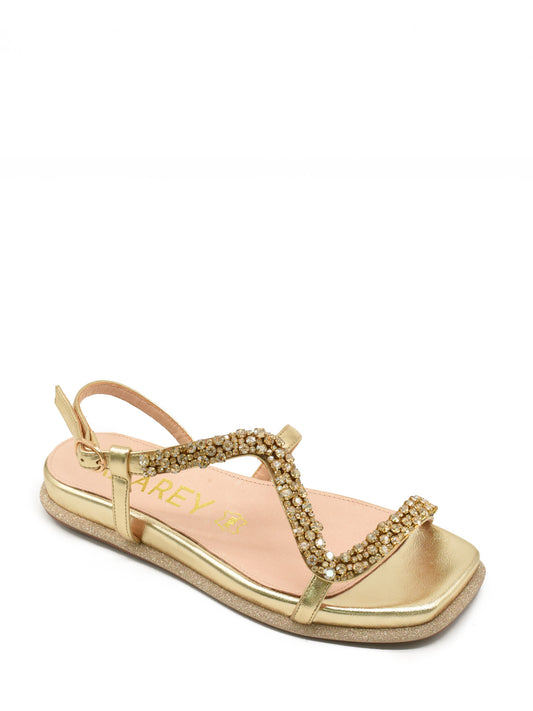 Flat gold sandal with rhinestone embellishment