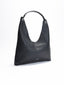 Women's burgundy hobo bag with interior toiletry bag