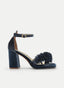 Blue platform sandals with flowers and a chunky heel.