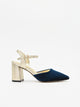 Scarpa in velluto blu marino con tacco dorato.