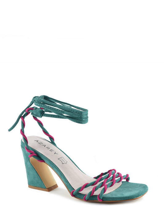 Sandal with interlocking straps in green and square heel